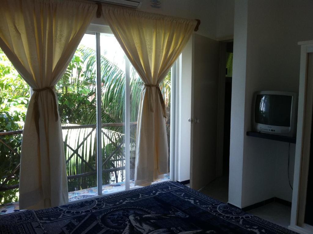 Hotel Residencia La Mariposa Тулум Стая снимка